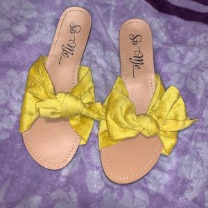 Yellow bow slippers